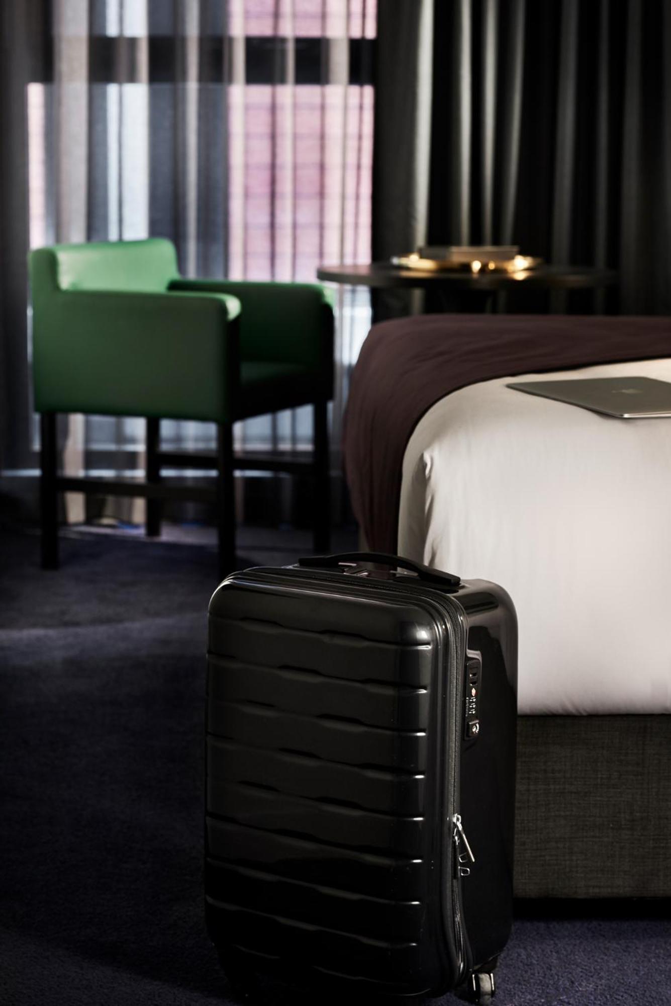 Midnight Hotel, Autograph Collection Canberra Ngoại thất bức ảnh A suitcase